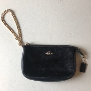 Calf hair and leather clutch wristlet
